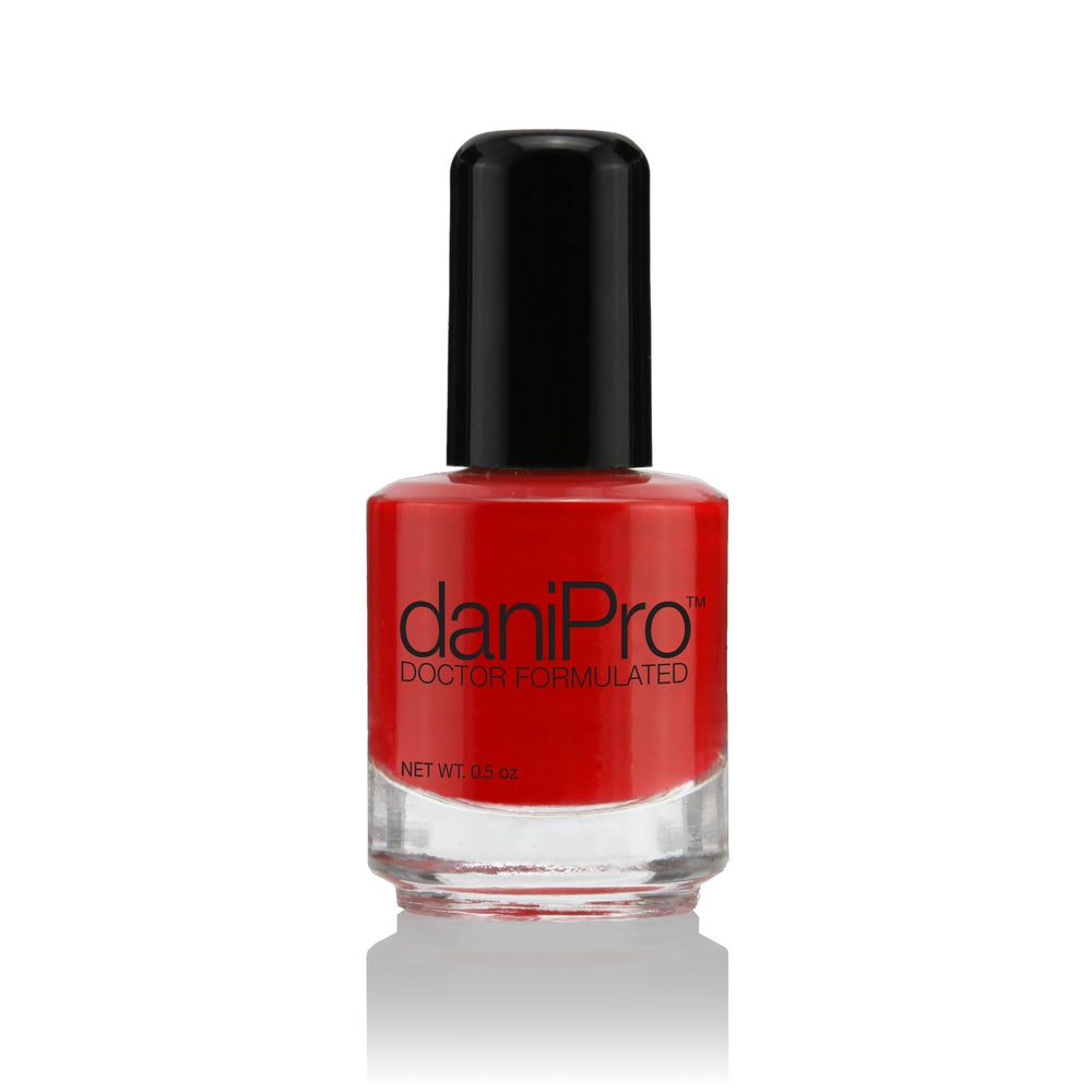 DaniPro First Kiss bottle front with bright red shade for a salon-perfect manicure.