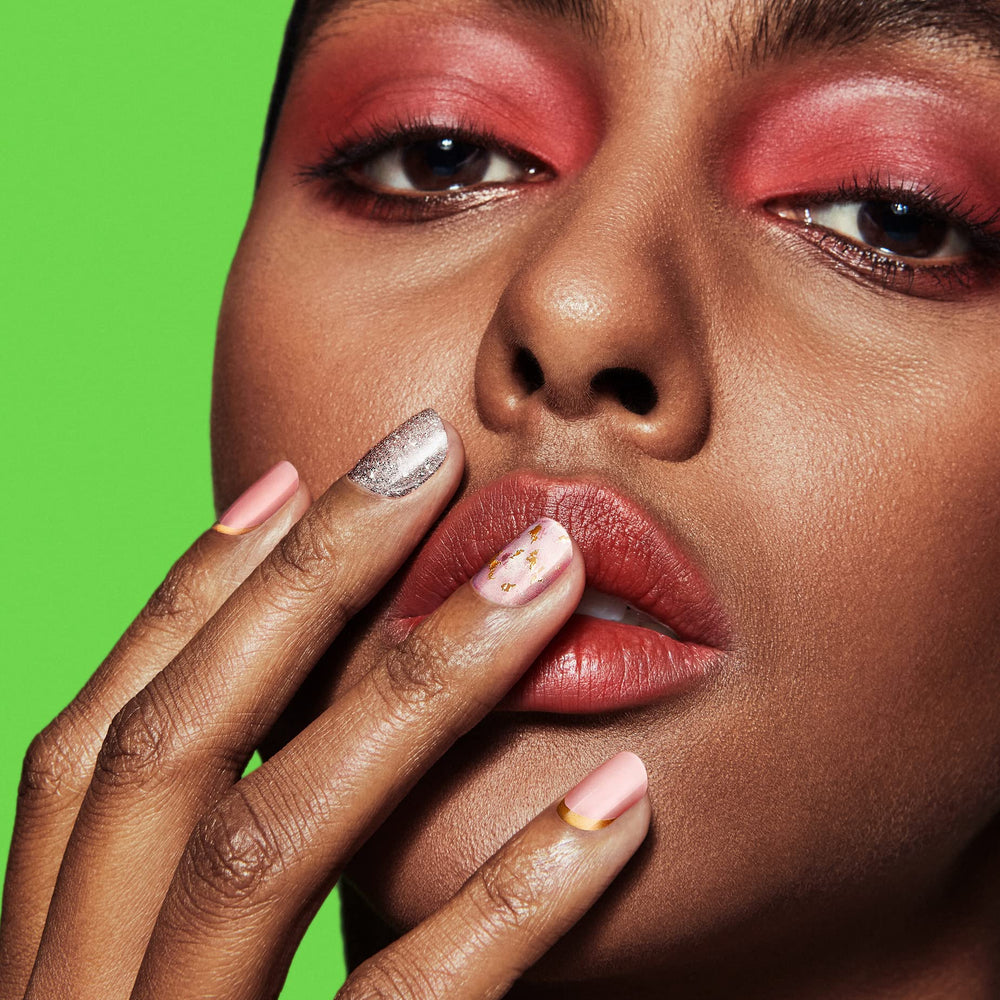 Dashing Diva Feeling Flush champagne glitter details with gold foil accents on nails