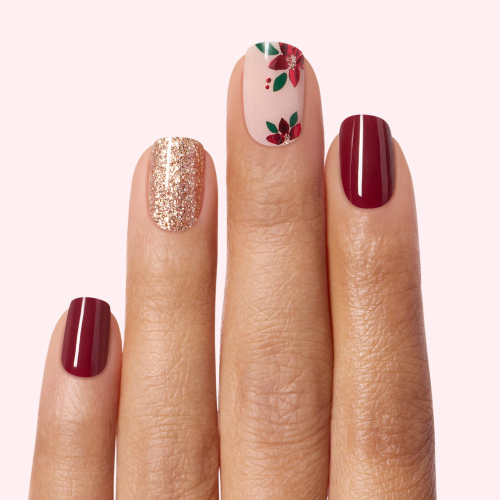 Dashing Diva Poinsettia Princess wraps with gold glitter on burgundy-white design for festive nails