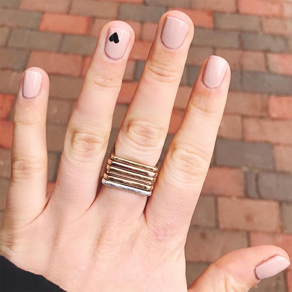 Dazzle Dry Boss nude on two-nail swatches reveals true neutral hue under daylight.