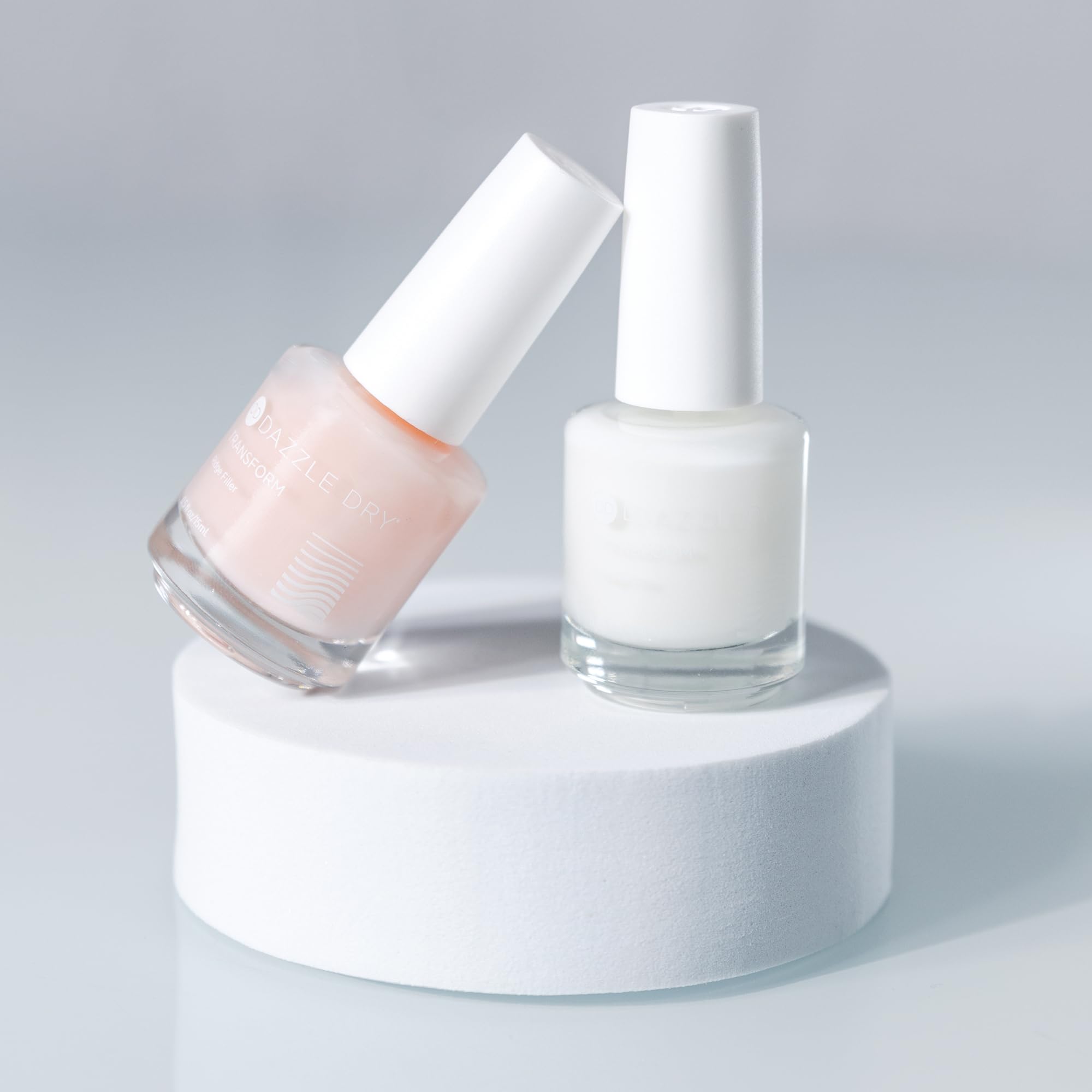 Dazzle Dry Nail Prep cleanses nails for better adhesion.