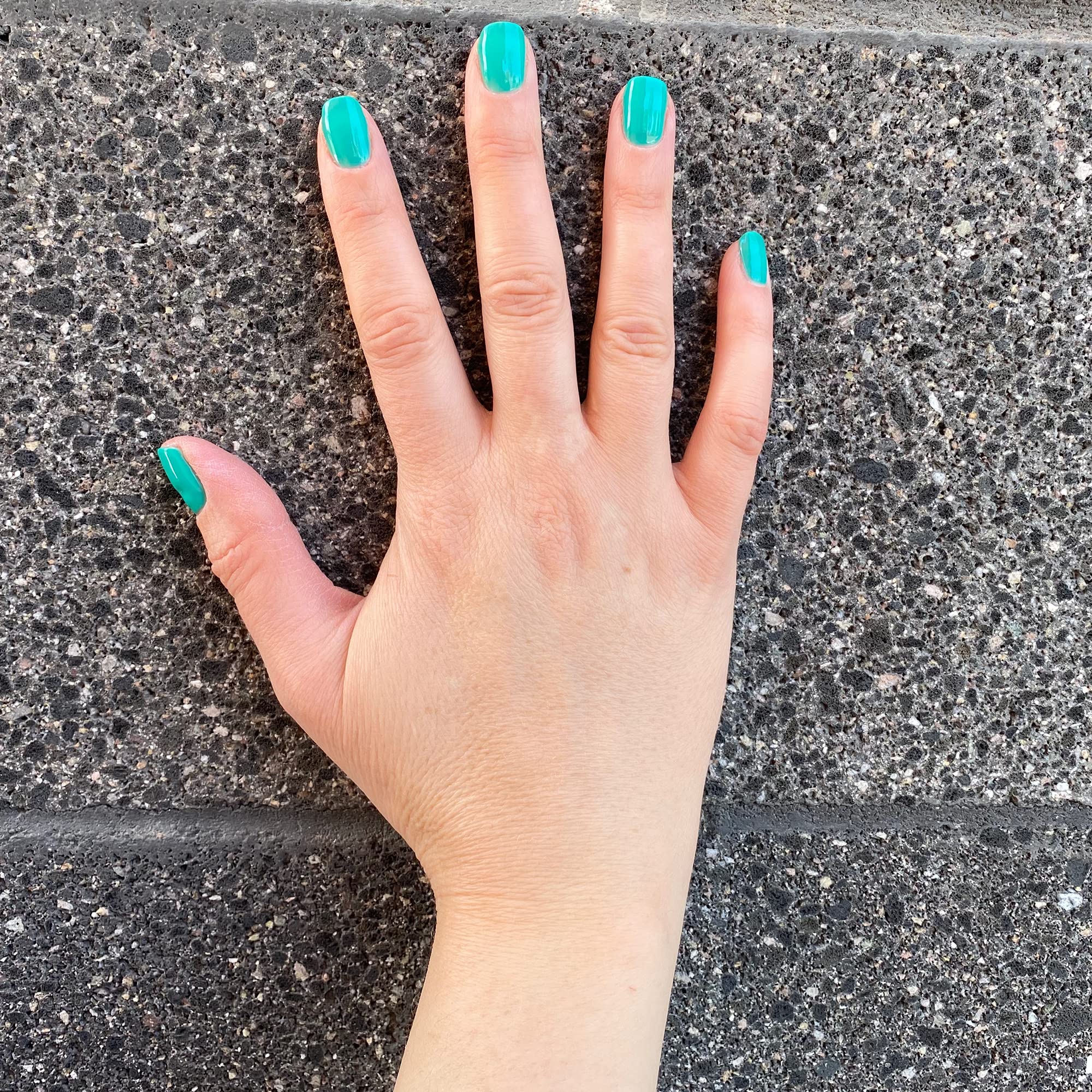 Dazzle Dry Palm Springs on-nails manicure highlights quick-dry finish