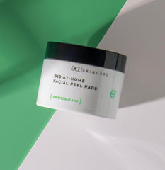 DCL G10 Radiance Peel pads in hand ready to decongest pores and target blemishes.