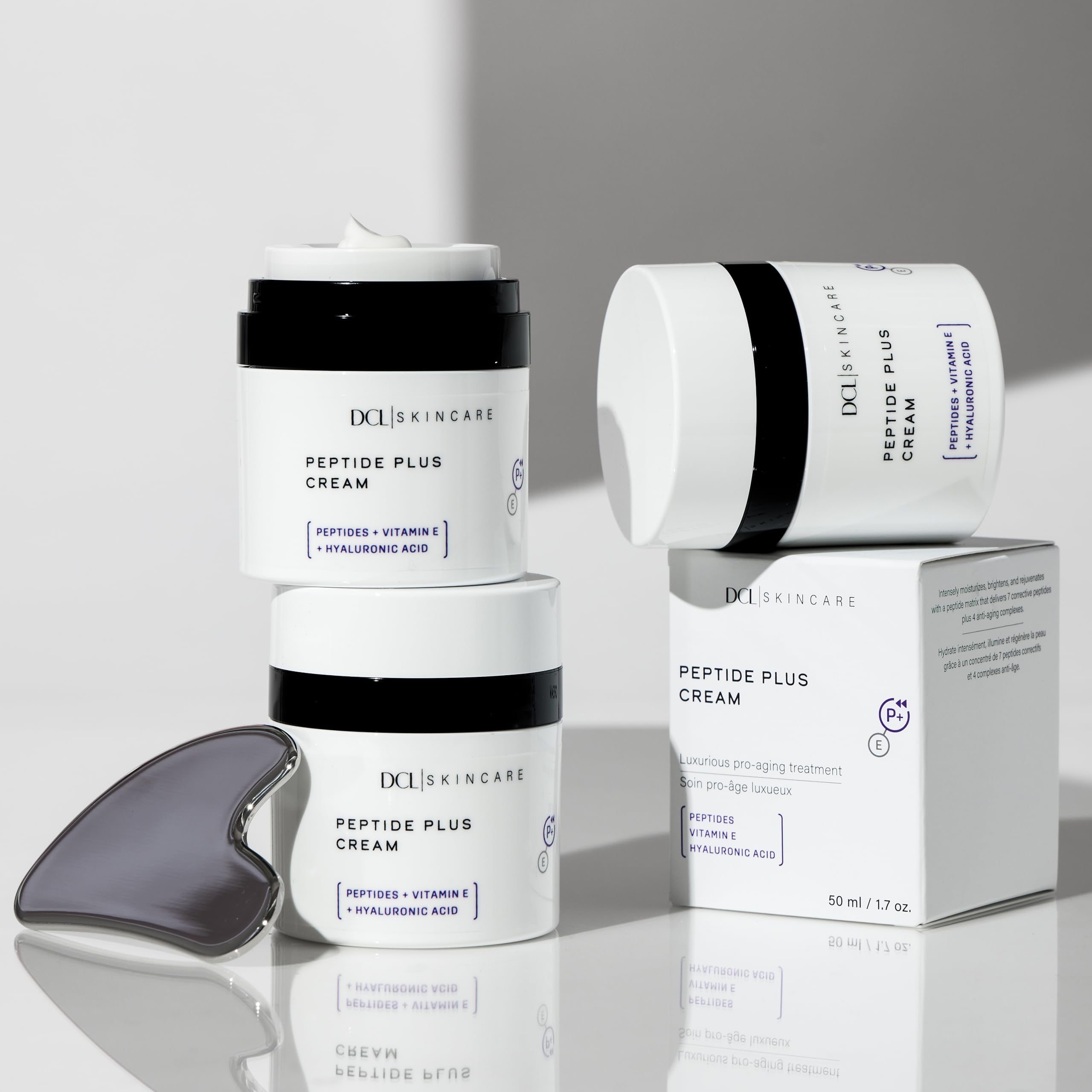 DCL Peptide Plus Cream on hands illustrating luxurious, quick-absorbing hydration.