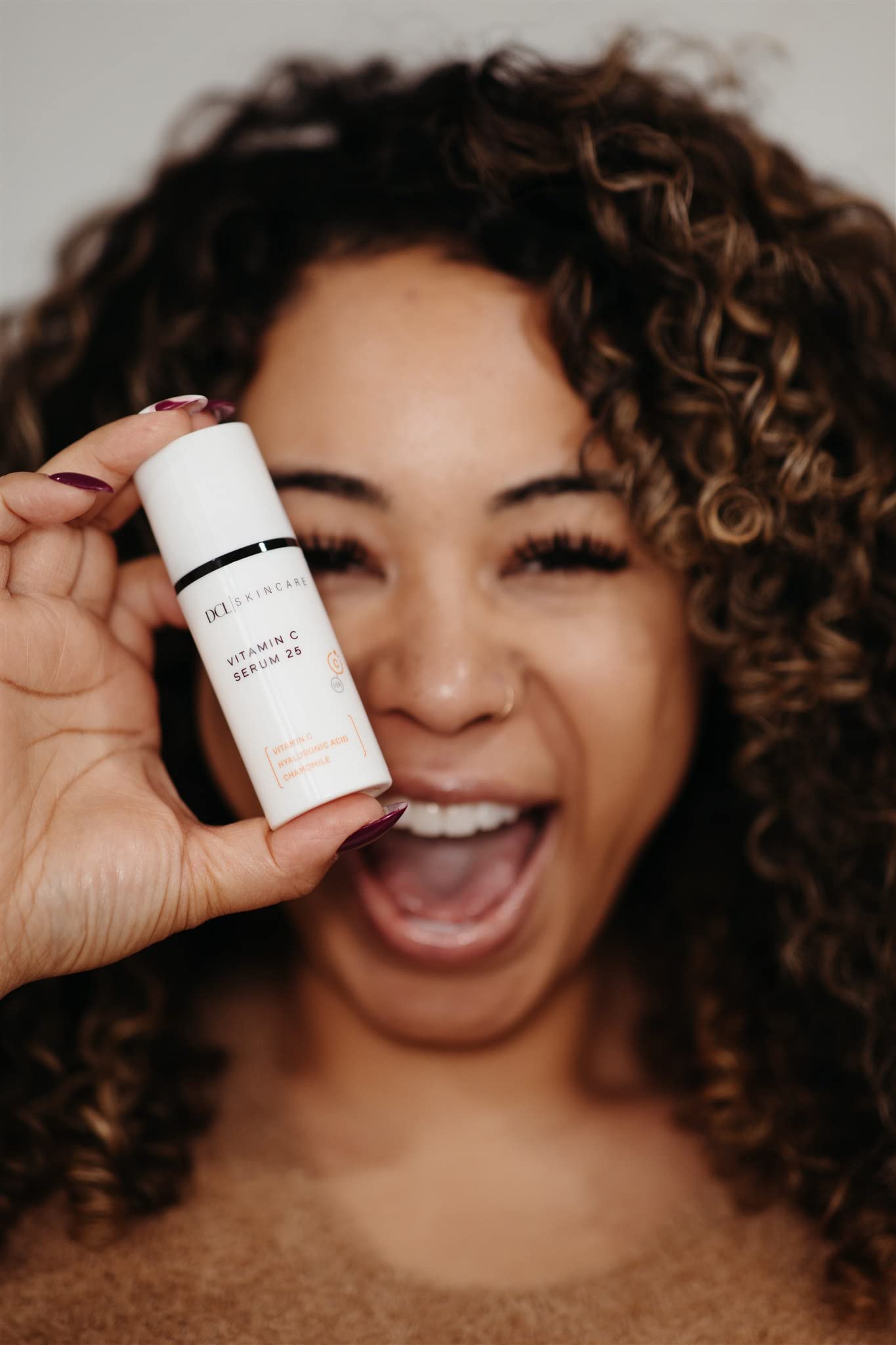 DCL Vitamin C Serum 25 travel tube illustrates portable skincare on the go.