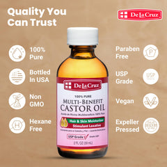 De La Cruz Castor Oil massaged onto scalp to soothe dryness