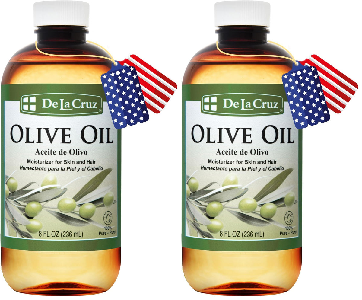 De La Cruz Pure Olive Oil bottle front view for hair and skin care