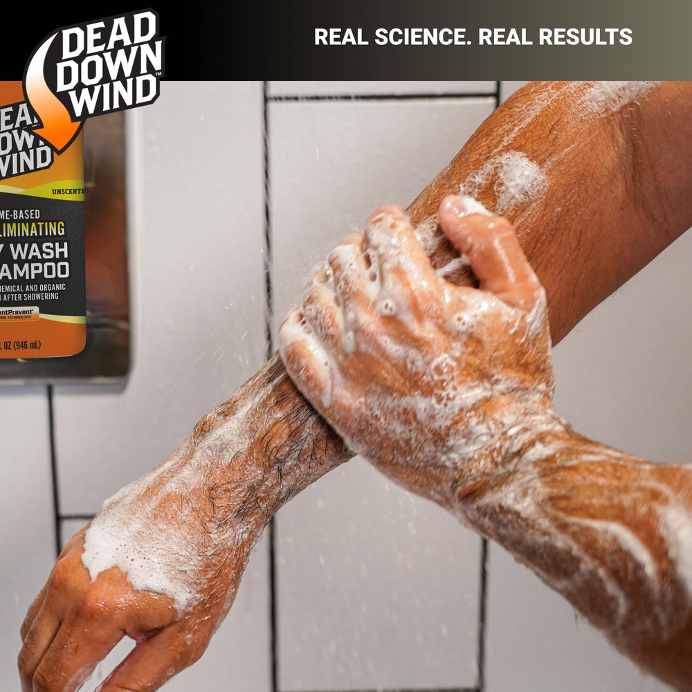 A shower setup with DEAD DOWN WIND soap in a hunting camp