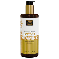 Dead Sea Collection Vitamin C Body Oil with pump dispenser for mess-free hydration.