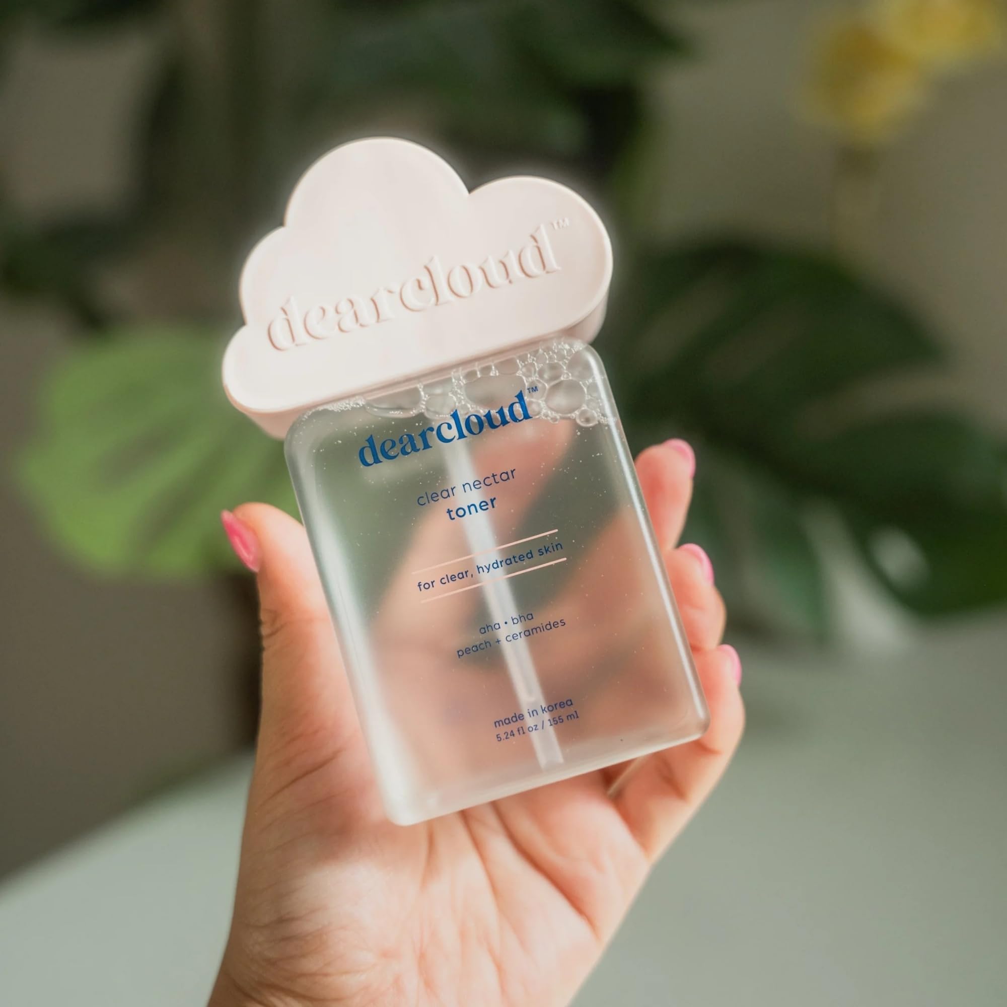 Daily skincare routine featuring Dearcloud toner and serums.