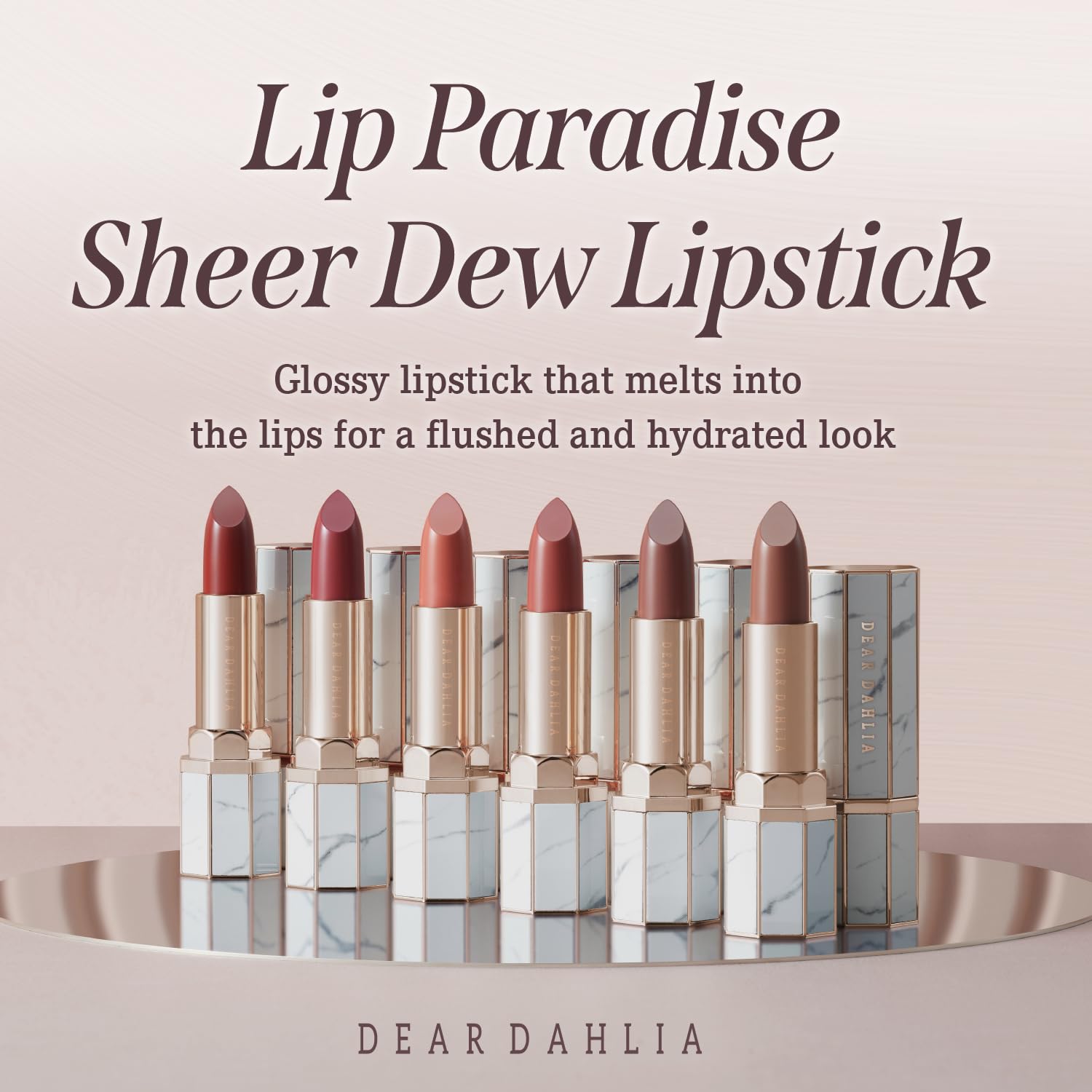DEARDAHLIA Lip Paradise Megan sheer swatch on lips shows dewy glow.