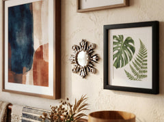 DecorContreras wall mirror in silver finish brightens a room.