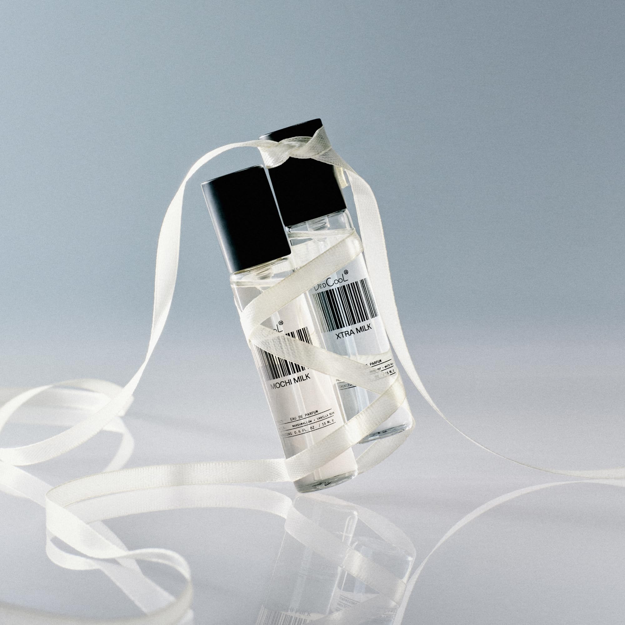 DedCool Milk bottle pour view highlighting easy application and clean spray
