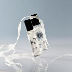 DedCool Milk bottle pour view highlighting easy application and clean spray