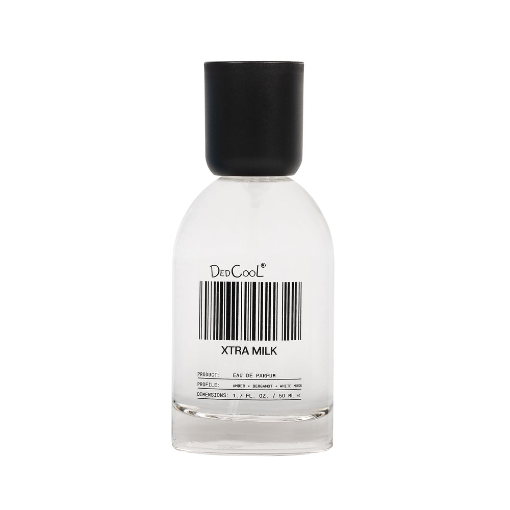 DedCool Xtra Milk bottle with spray delivering a lasting aroma.