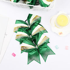 Rhinestone detailing on DEEKA bows shown in close-up view.