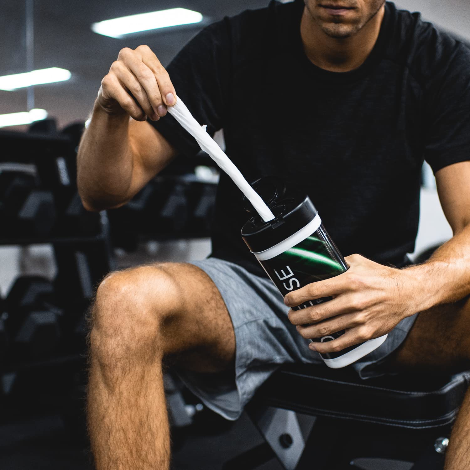 Defense Soap compact pack on gym bag for on-the-go use.