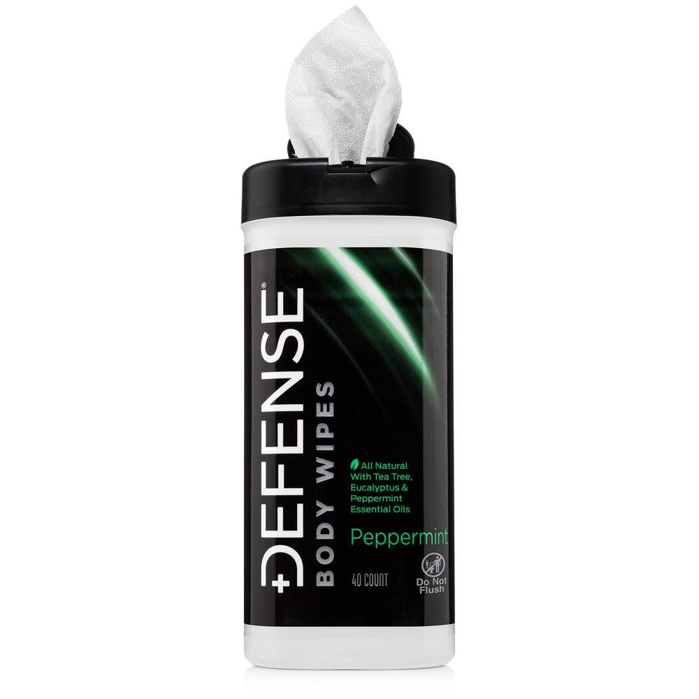 Defense Soap post-workout wipe in action cleansing arms and shoulders.