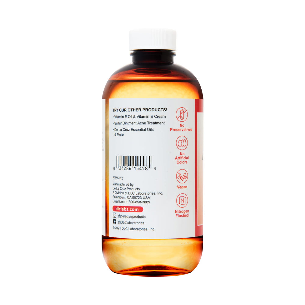 De La Cruz Almond Oil on skin for smooth texture