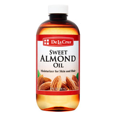 De La Cruz Sweet Almond Oil bottle front for natural skin moisture