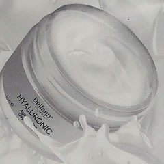 Delfanti Milano cream texture close-up shows rich yet lightweight absorption.