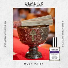 DEMETER Holy Water in hand, compact bottle for on-the-go scent.