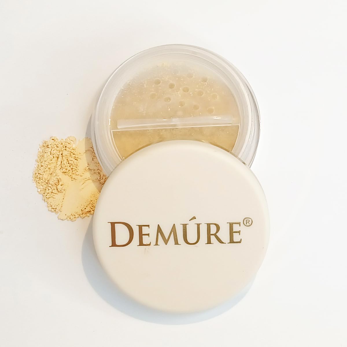 Demure cruelty-free USA-made badge on concealer packaging