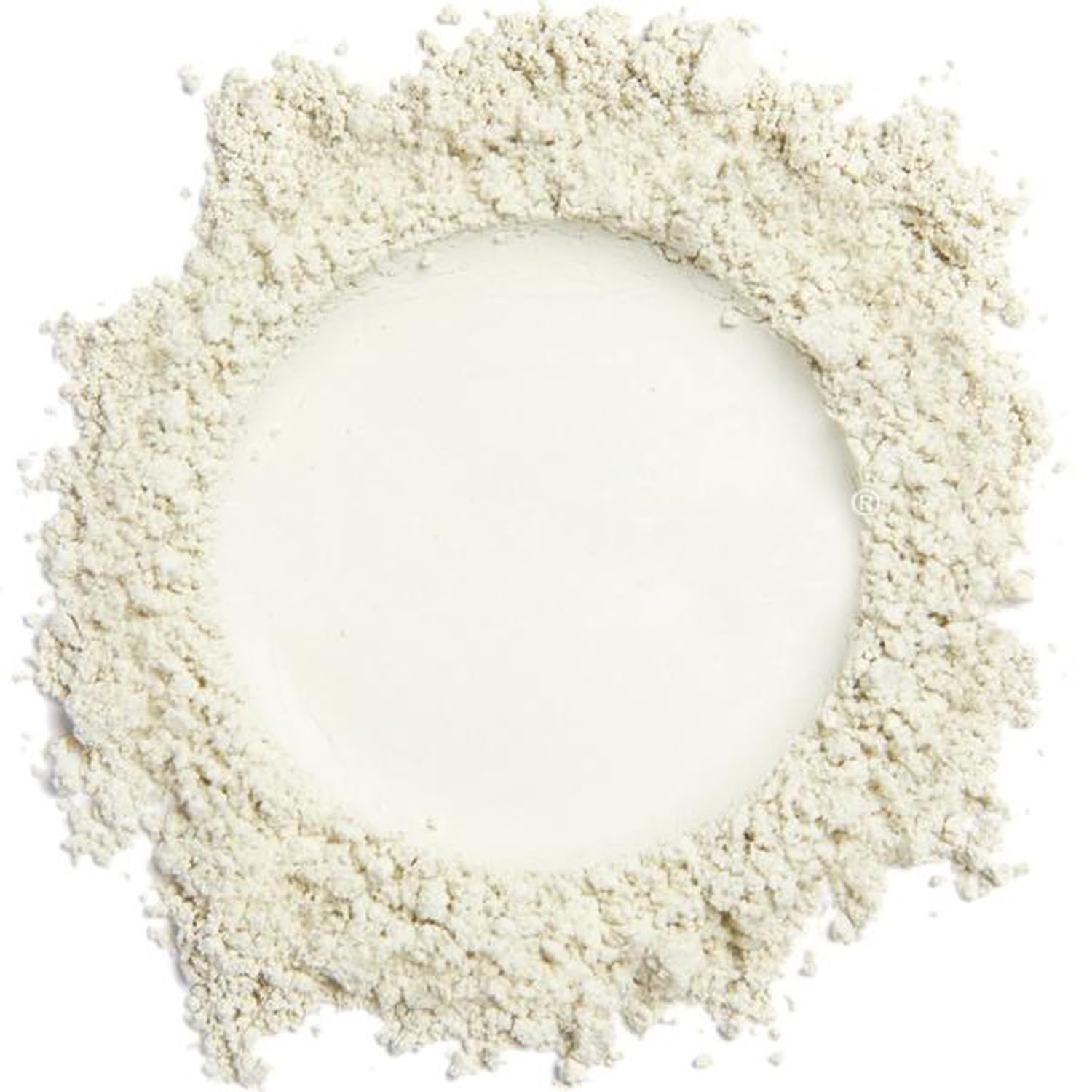Demure Mineral Concealer tube swirl demonstrates the yellow-toned brightening formula.