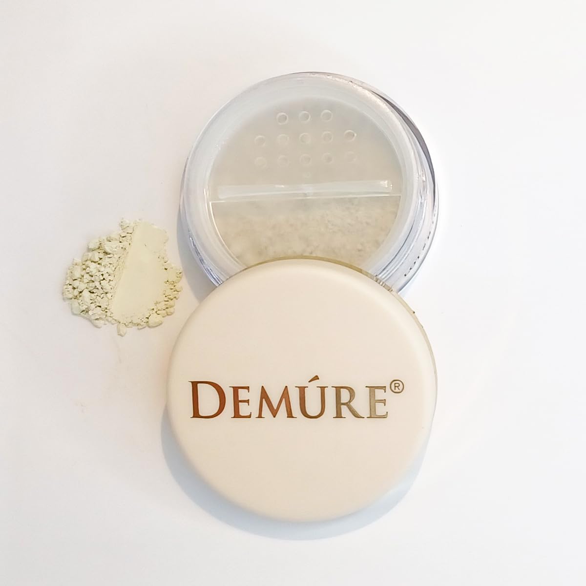 Demure Mineral Concealer under-eye application shows smooth, buildable coverage.