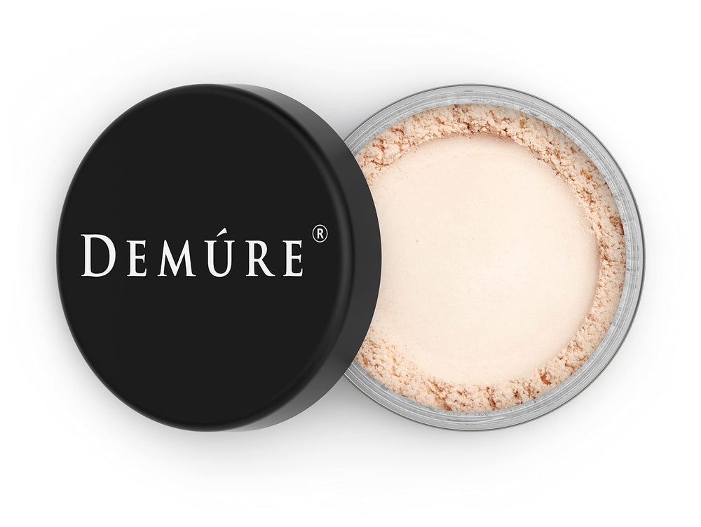 DEMÚRE mineral finishing powder jar for a natural, long-lasting finish.