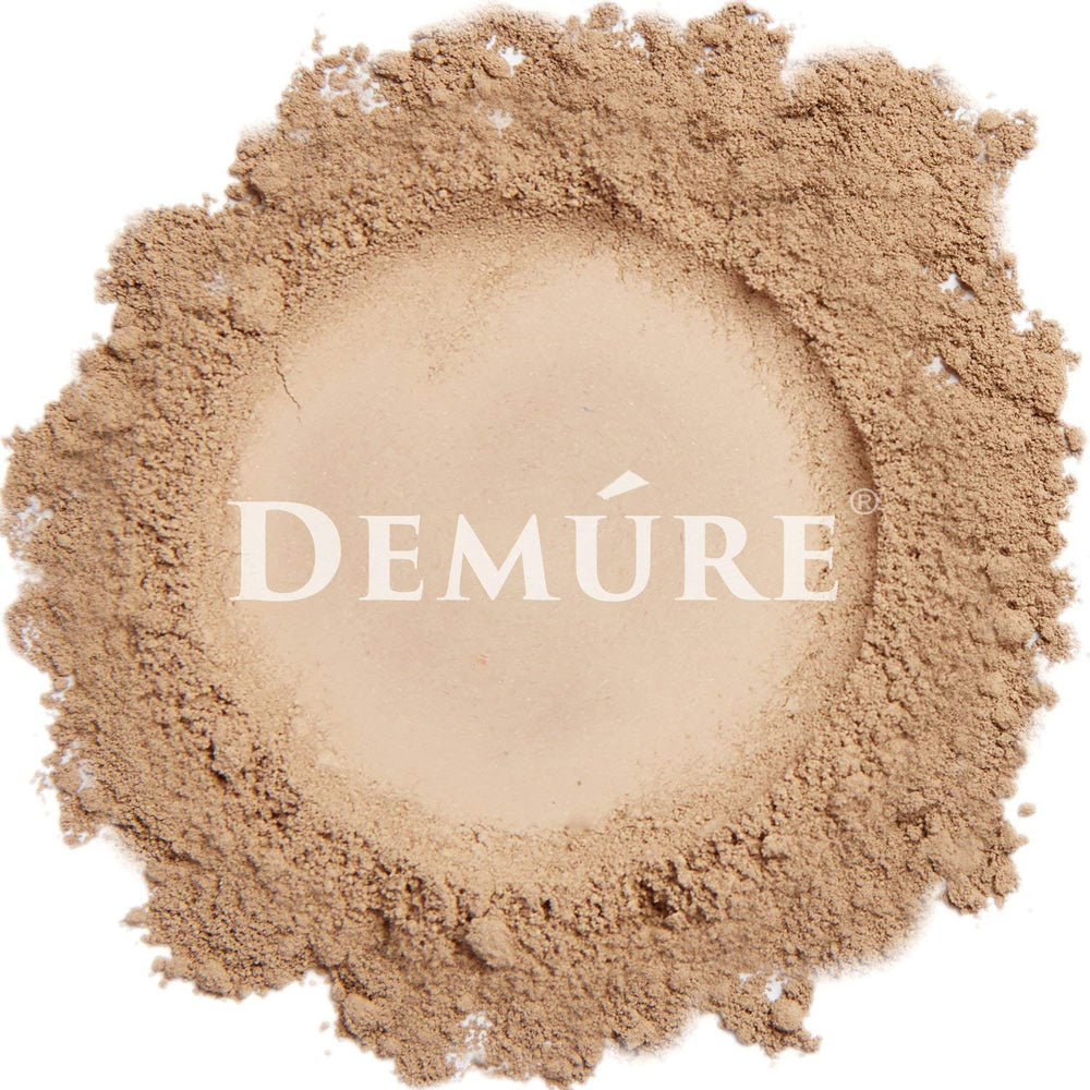 Demure Mineral Foundation swatches reveal rich pigment for buildable coverage.