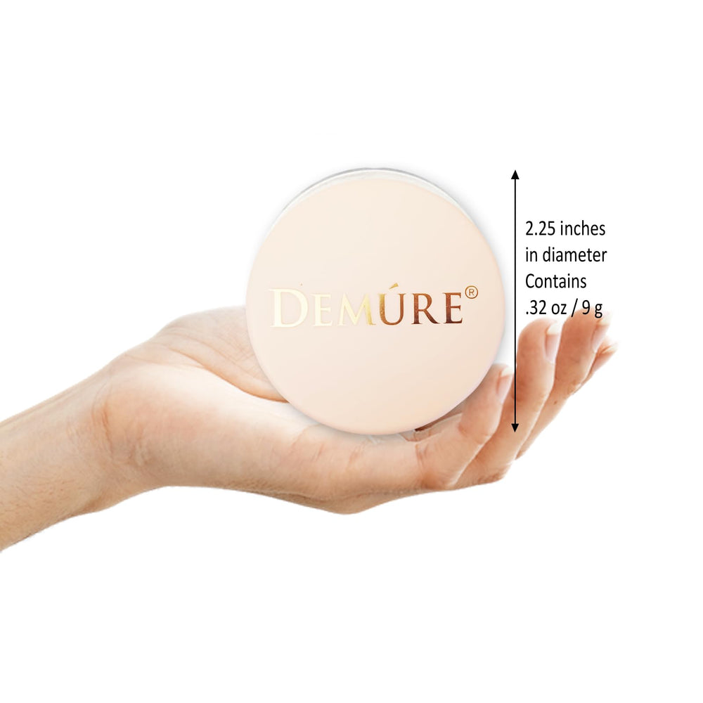 Demure Mineral Loose Powder jar captures finely milled formula for a soft finish.
