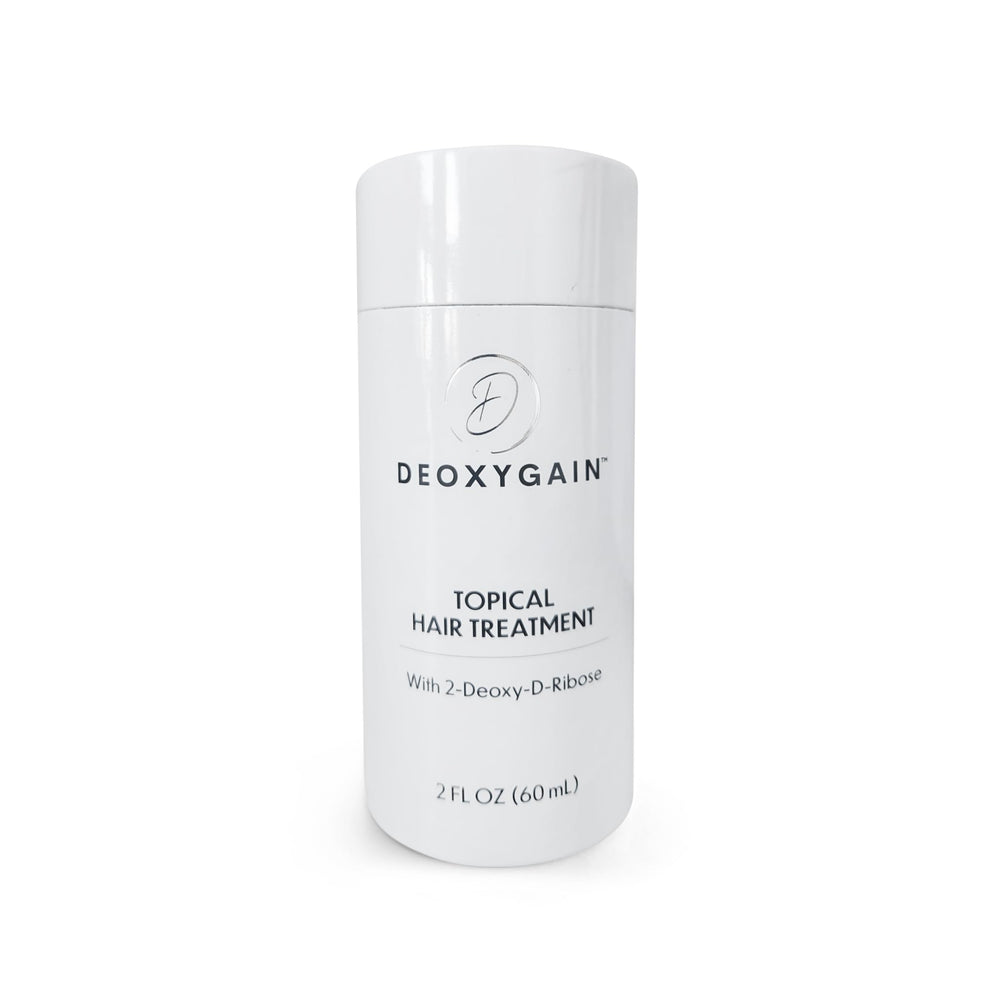 Deoxygain Hair Serum bottle top view emphasizes compact 2oz packaging