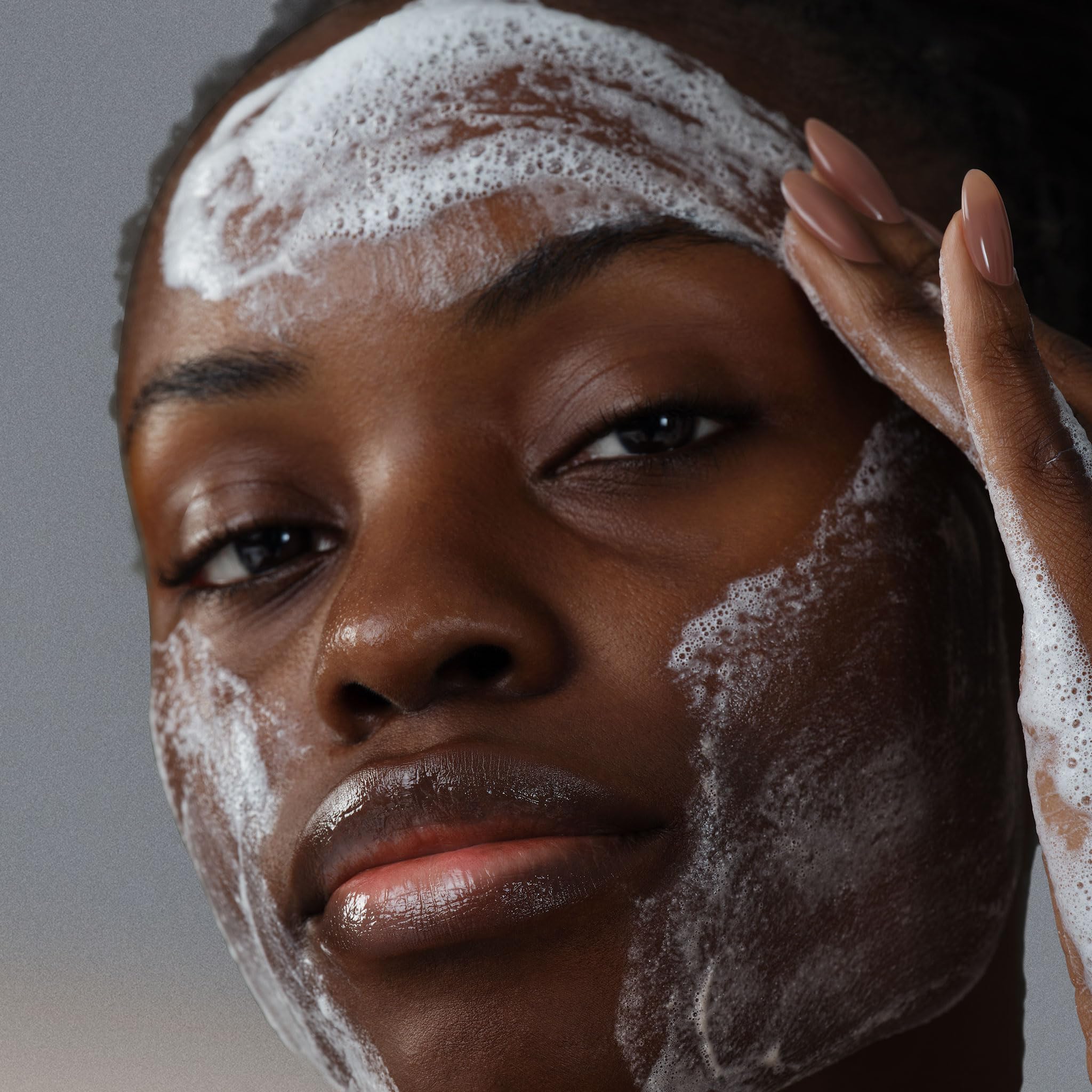 Dermalogica Daily Microfoliant powder close-up shows gentle exfoliation texture.