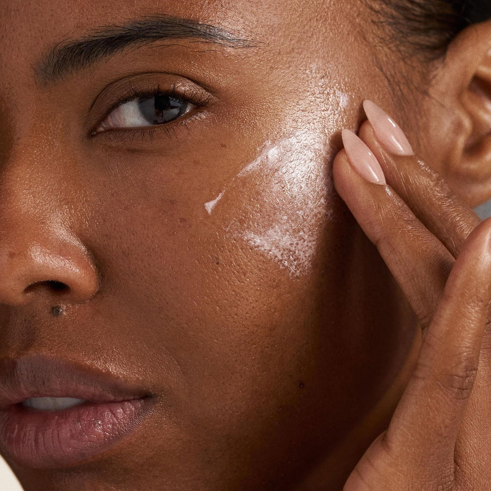 Close-up of Prisma Protect SPF30 texture on skin showing hydration