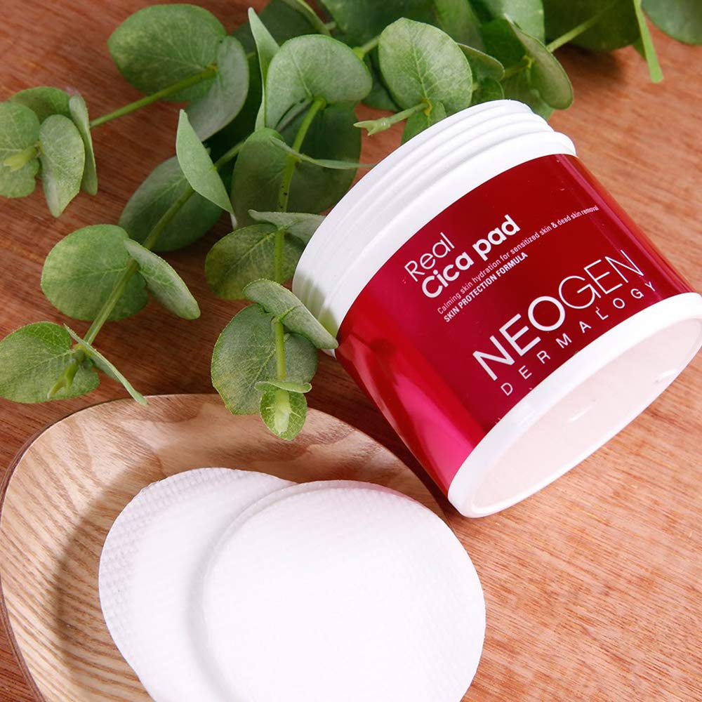 Pads with textured fibers demonstrating soft exfoliation and cleansing action