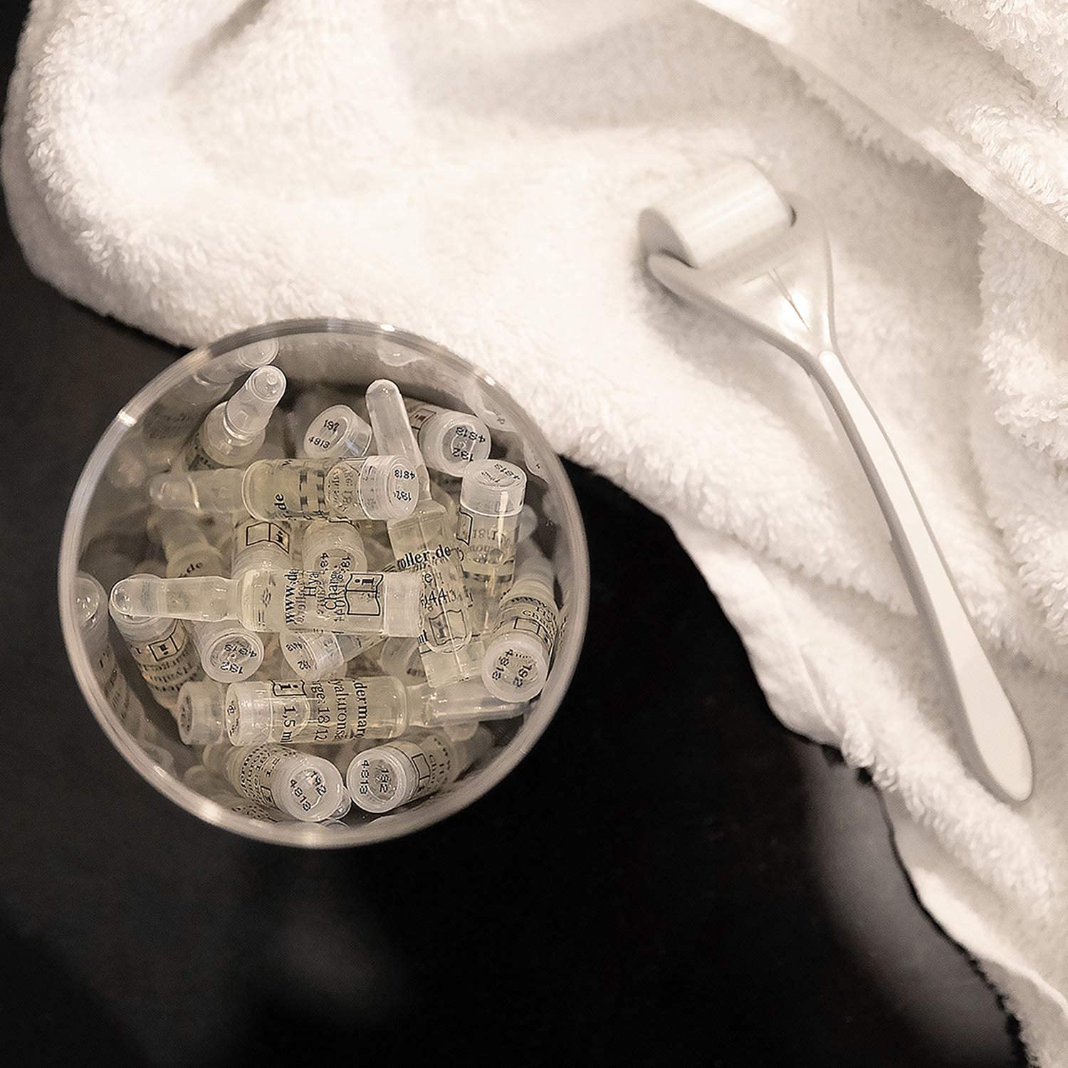 Close-up of ampoules hinting at anti-aging hydration and skin renewal