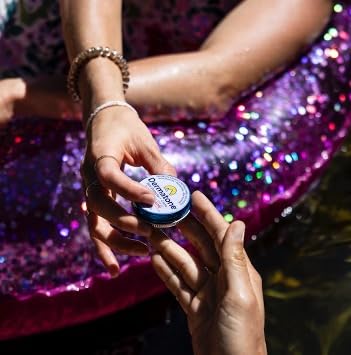 Dermatone Skin Protector being applied to lips outdoors