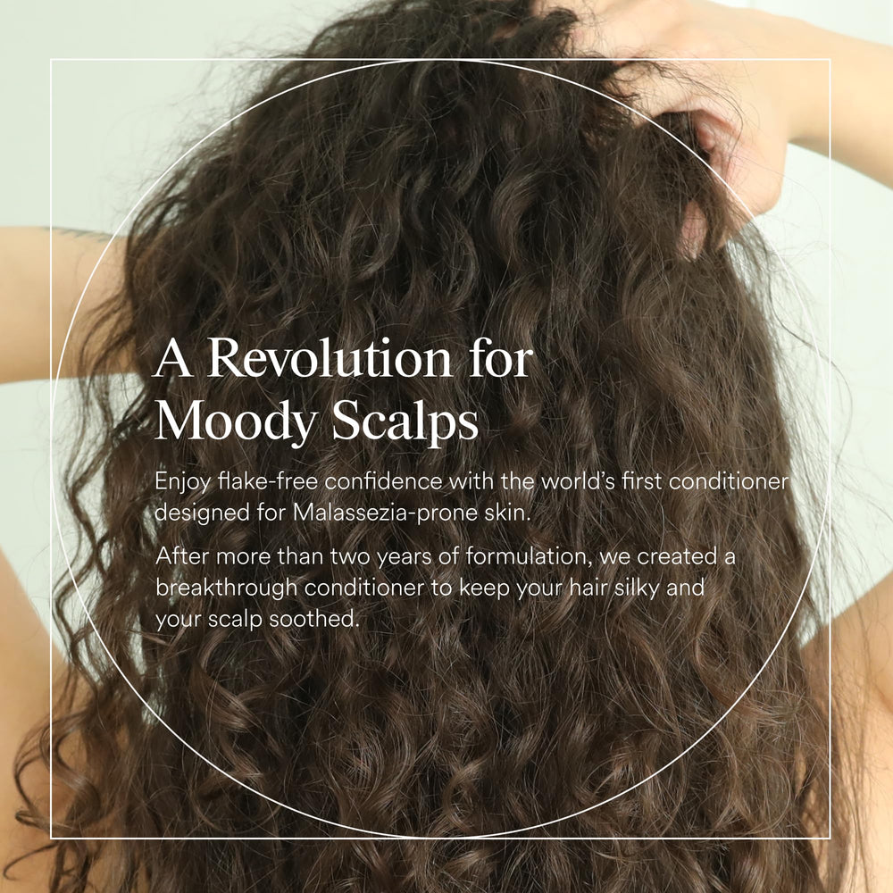 Dermazen Nourishing Conditioner application on hair shows smooth, silky strands.