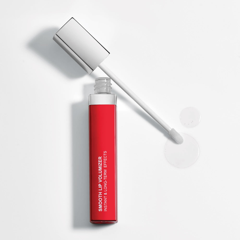 Bottle with label of Dermelect Smooth Lip Volumizer on clean surface