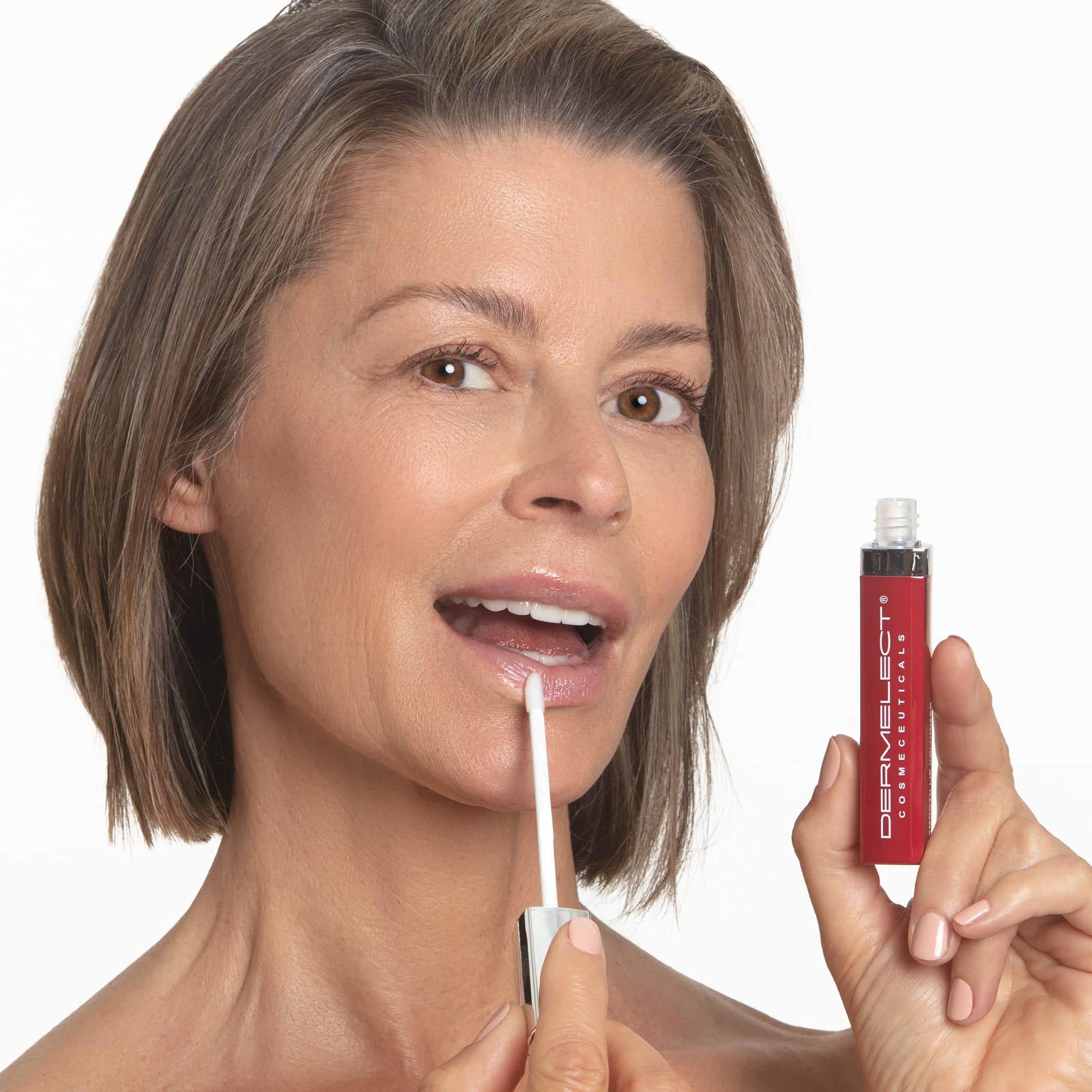 Lips with glossy finish after applying Dermelect Lip Volumizer