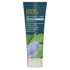 Desert Essence Dry Scalp Shampoo bottle closeup, balanced cleansing for a healthy scalp.