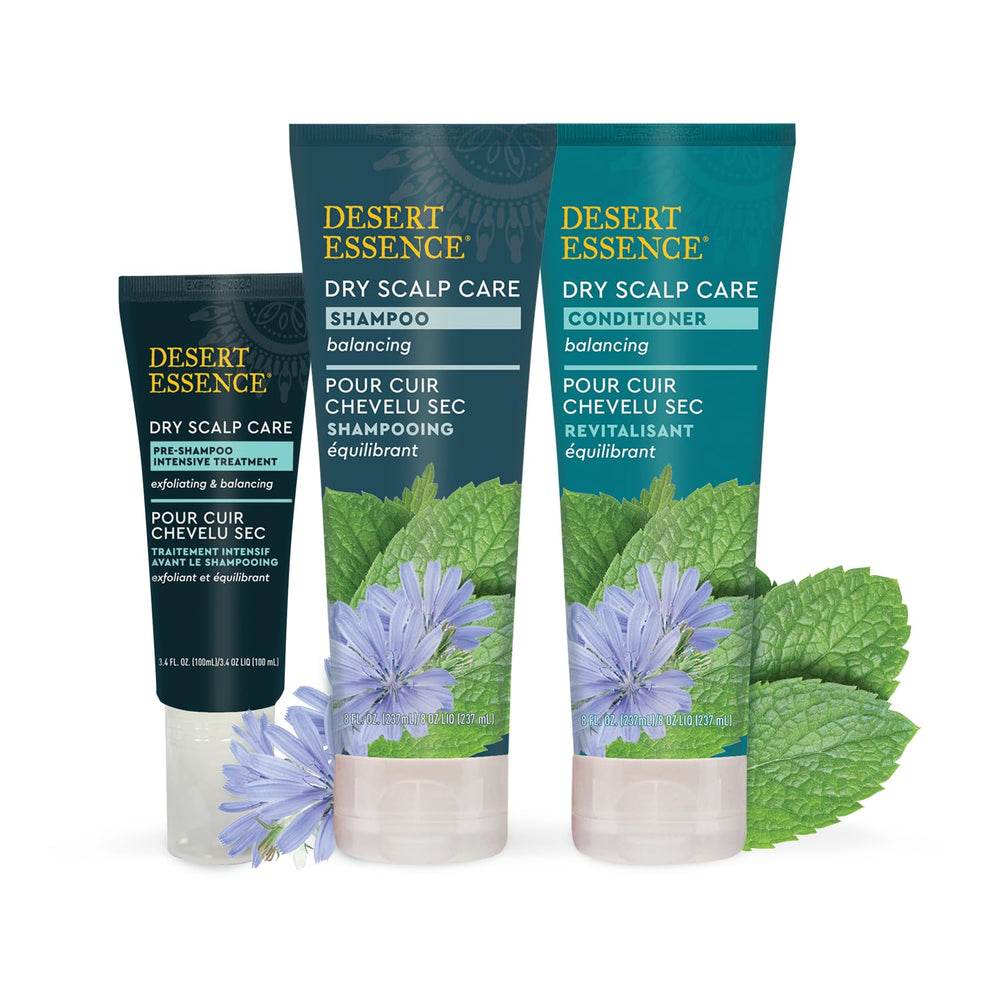 Desert Essence Dry Scalp Shampoo bottle with rich lather for gentle cleansing.