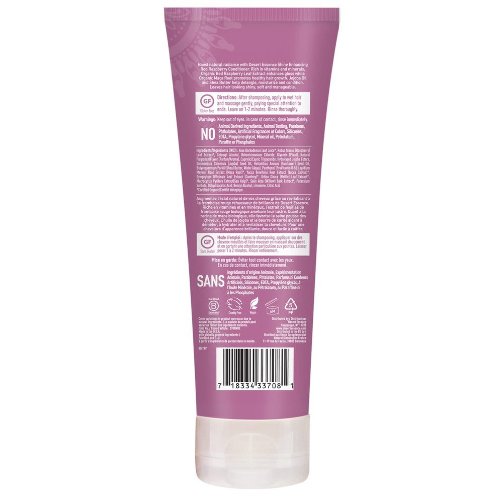 Desert Essence Red Raspberry conditioner texture close-up showing creamy richness.
