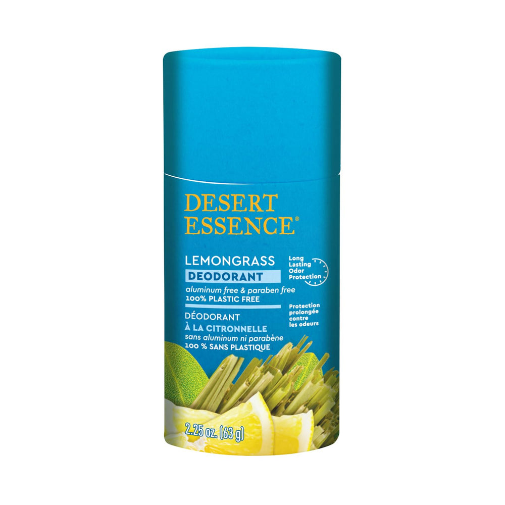 Desert Essence Tea Tree Deodorant bottle close-up showing natural ingredients like coconut oil.