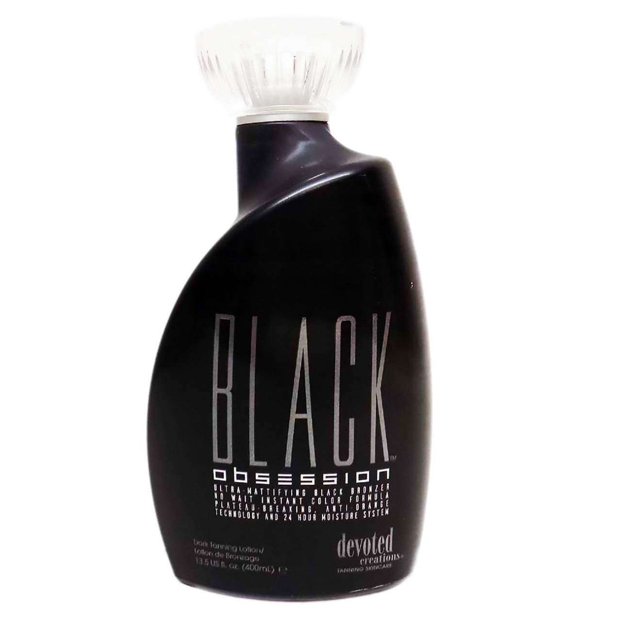 Devoted Creations Black Obsession bottle pour showing instant color and even bronze