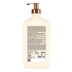 Devoted Creations Coco Creamsicle bottle pour for smooth daily moisturization.