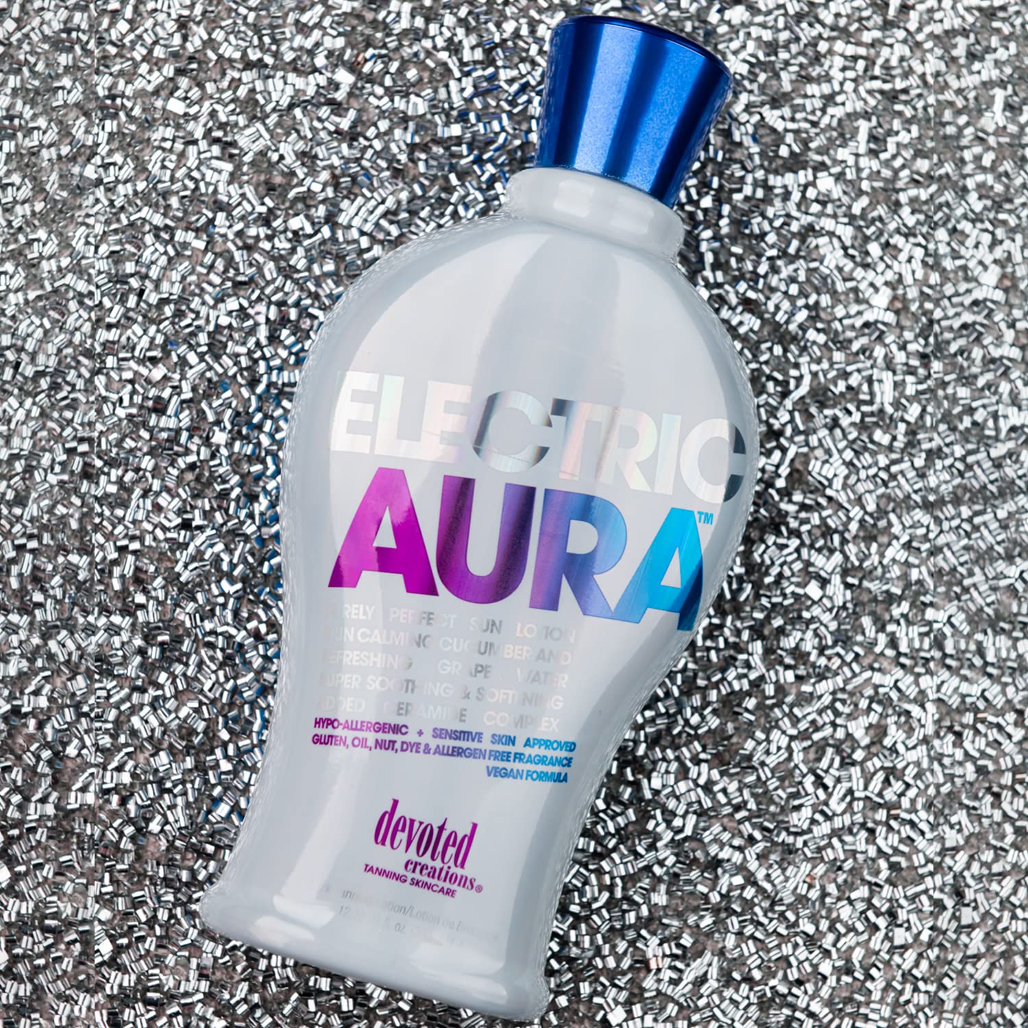 Devoted Creations Electric Aura packaging emphasizes hypoallergenic fragrance and eco-conscious design