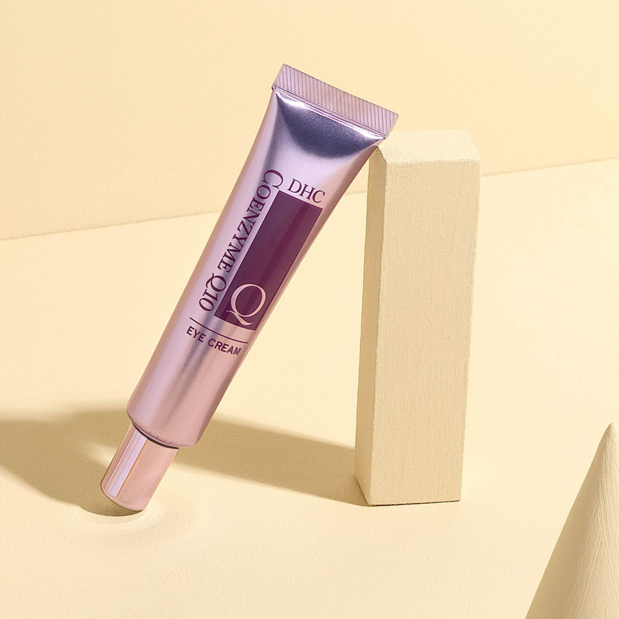 DHC CoQ10 Eye Cream packaging display highlights fragrance-free formula.