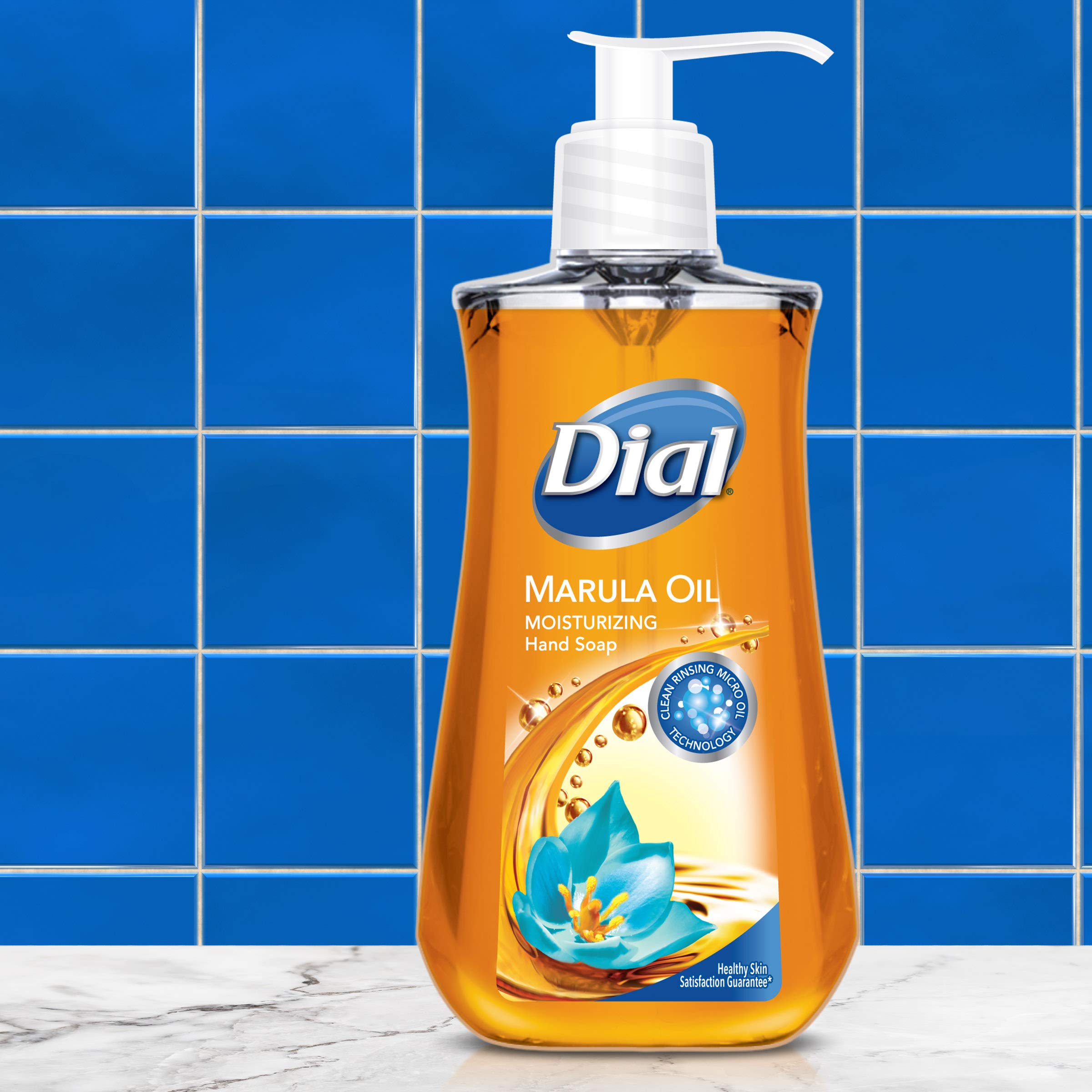 Dial Marula Oil hand soap foam on hands during washing.